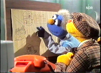 Elvis und Spencer beim Gestalten eines Dorfplanes, 1984